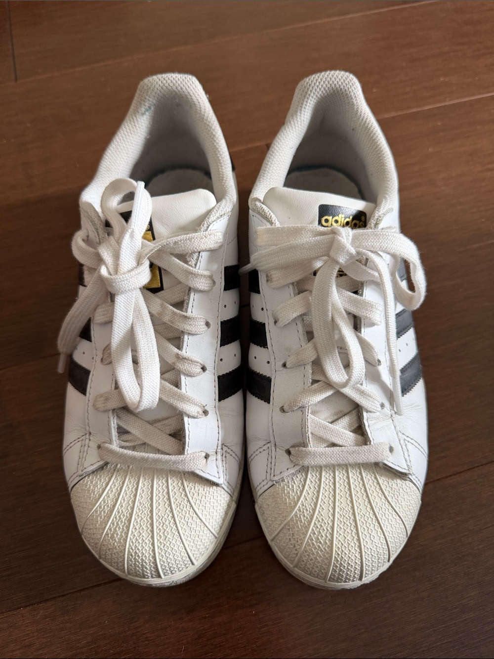 Adidas White Sneakers with Black Stripes